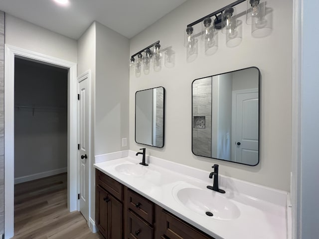 553 Sequoyah Dr, Morristown, TN 37813 - full bath with wood finished floors, double vanity, and a spacious closet