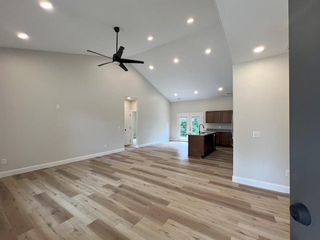 553 Sequoyah Dr, Morristown, TN 37813 - unfurnished living room with ceiling fan, high vaulted ceiling, a sink, light wood finished floors, and recessed lighting