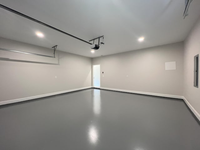 553 Sequoyah Dr, Morristown, TN 37813 - garage with recessed lighting, a garage door opener, and baseboards