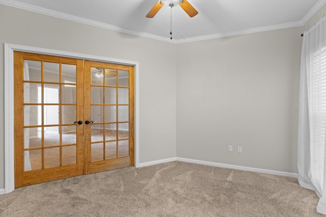 unfurnished room with crown molding, ceiling fan, carpet floors, and french doors