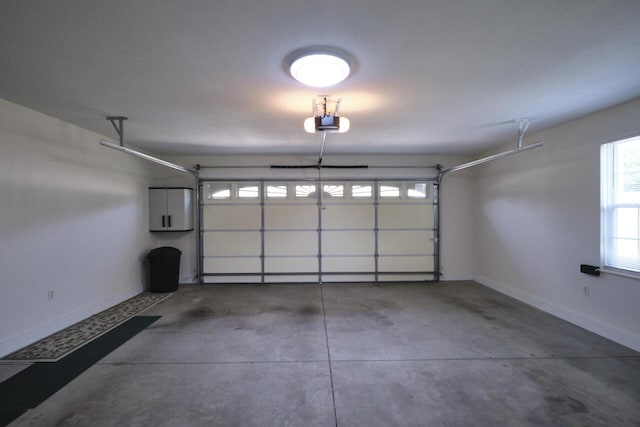 garage featuring a garage door opener