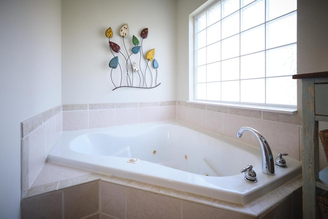 bathroom featuring tiled bath