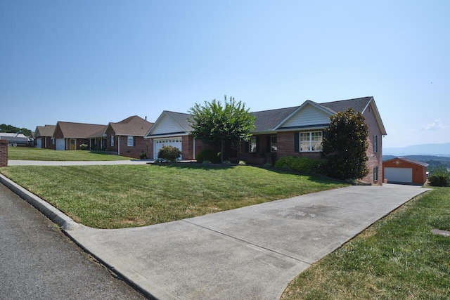 ranch-style house featuring a garage and a front lawn