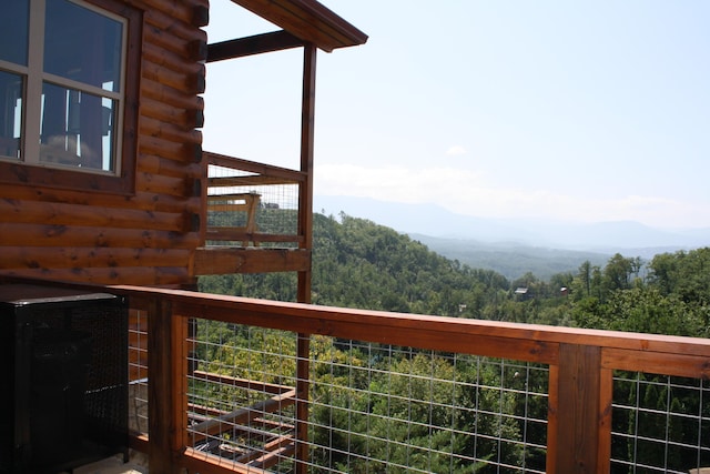 balcony featuring a mountain view