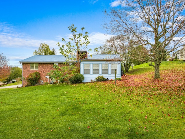 exterior space with a lawn