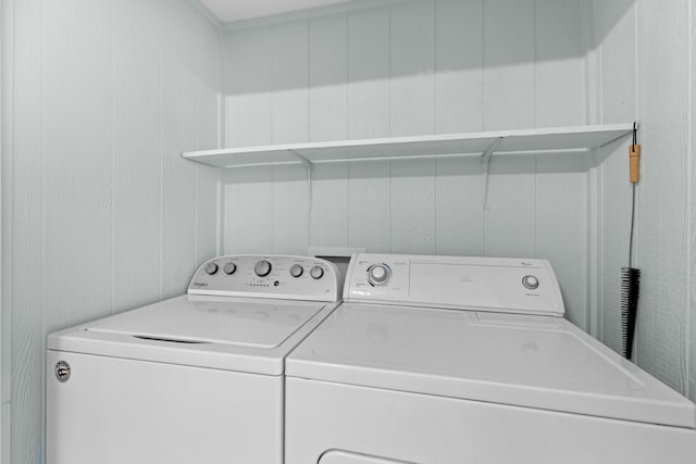 laundry room with washer and clothes dryer and laundry area