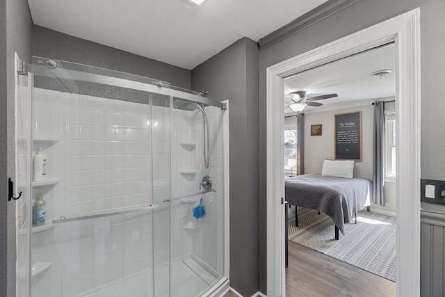 45 Link Hills Cir, Greeneville, TN 37743 - bathroom with wood finished floors, a stall shower, and a ceiling fan