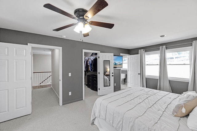 45 Link Hills Cir, Greeneville, TN 37743 - bedroom with baseboards, light carpet, a spacious closet, ceiling fan, and a closet