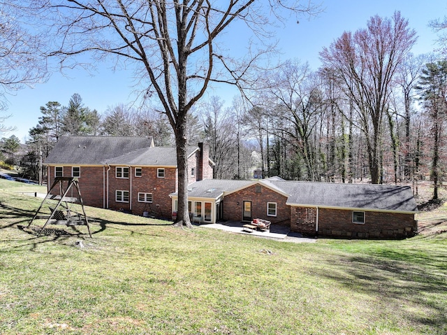 45 Link Hills Cir, Greeneville, TN 37743 - rear view of property with brick siding, a patio, a chimney, and a lawn