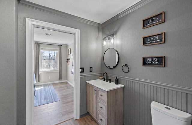 45 Link Hills Cir, Greeneville, TN 37743 - half bathroom with crown molding, wood finished floors, toilet, vanity, and wainscoting