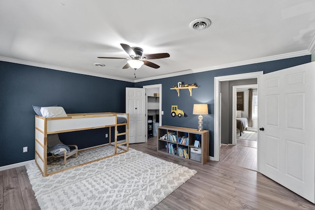 45 Link Hills Cir, Greeneville, TN 37743 - bedroom featuring baseboards, wood finished floors, and ornamental molding