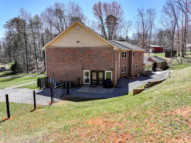 45 Link Hills Cir, Greeneville, TN 37743 - rear view of property featuring french doors, a patio area, and brick siding