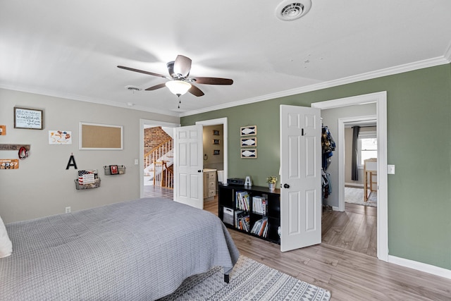 45 Link Hills Cir, Greeneville, TN 37743 - bedroom featuring ornamental molding, light wood-type flooring, baseboards, and a ceiling fan