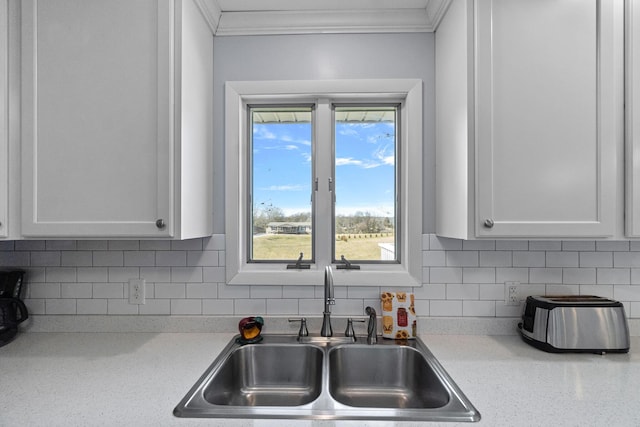 1554 Old Parrotsville Hwy, Parrottsville, TN 37843 - kitchen featuring a sink, crown molding, light countertops, and white cabinets