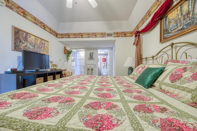 bedroom with ceiling fan and visible vents