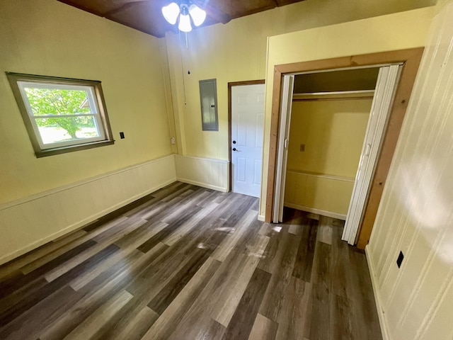 4124 Big Creek Rd, Hartford, TN 37753 - unfurnished bedroom with electric panel, dark wood-style flooring, a closet, and a wainscoted wall