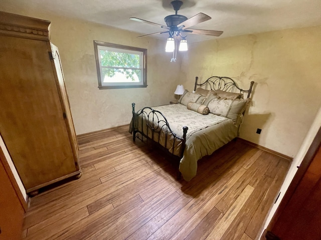 4124 Big Creek Rd, Hartford, TN 37753 - bedroom featuring wood-type flooring, ceiling fan, and baseboards