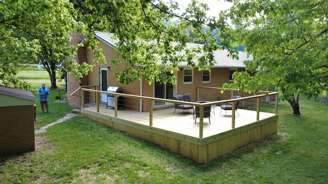 4124 Big Creek Rd, Hartford, TN 37753 - rear view of property featuring a deck, brick siding, and a yard