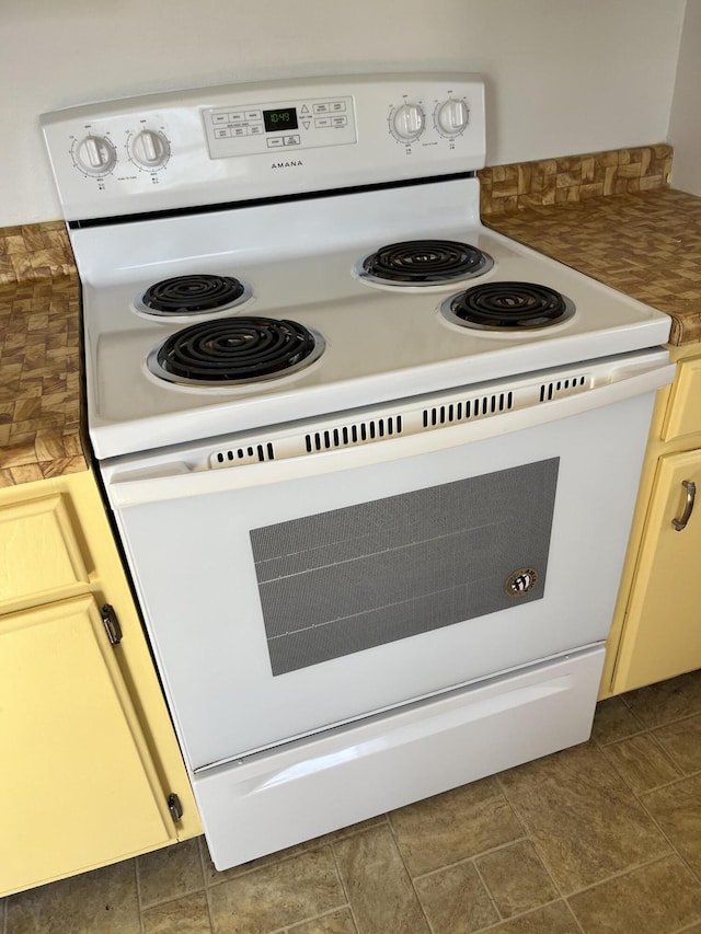 interior details featuring white electric stove