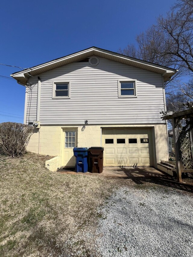 view of home's exterior with an attached garage