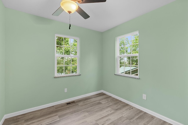 812 Donna St, Morristown, TN 37814 - empty room with a ceiling fan, baseboards, a healthy amount of sunlight, and visible vents