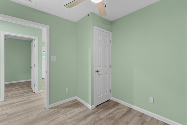 812 Donna St, Morristown, TN 37814 - unfurnished bedroom featuring light wood finished floors, baseboards, and ceiling fan