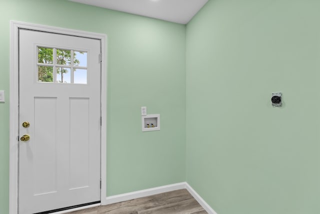 812 Donna St, Morristown, TN 37814 - clothes washing area featuring wood finished floors, laundry area, electric dryer hookup, baseboards, and hookup for a washing machine