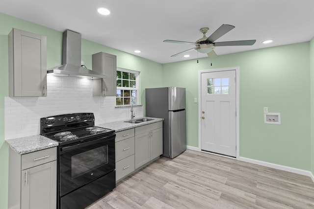 812 Donna St, Morristown, TN 37814 - kitchen featuring a sink, freestanding refrigerator, black range with electric stovetop, wall chimney range hood, and gray cabinetry