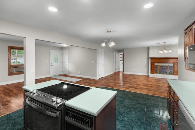 1327 Clinch View Cir, Jefferson City, TN 37760 - kitchen with a chandelier, stainless steel range with electric stovetop, light countertops, open floor plan, and recessed lighting