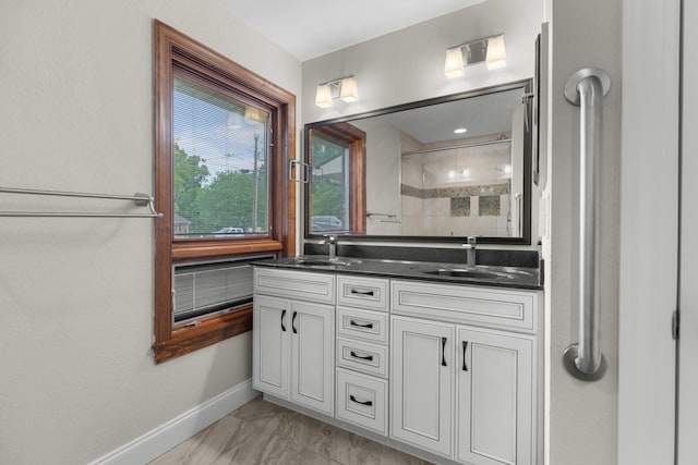 1327 Clinch View Cir, Jefferson City, TN 37760 - bathroom featuring baseboards, a stall shower, double vanity, and marble finish flooring