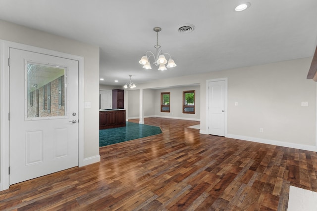 1327 Clinch View Cir, Jefferson City, TN 37760 - unfurnished living room featuring a chandelier, dark wood-type flooring, baseboards, and recessed lighting