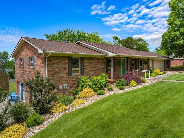 1327 Clinch View Cir, Jefferson City, TN 37760 - single story home with a porch, a front lawn, an attached garage, brick siding, and roof with shingles
