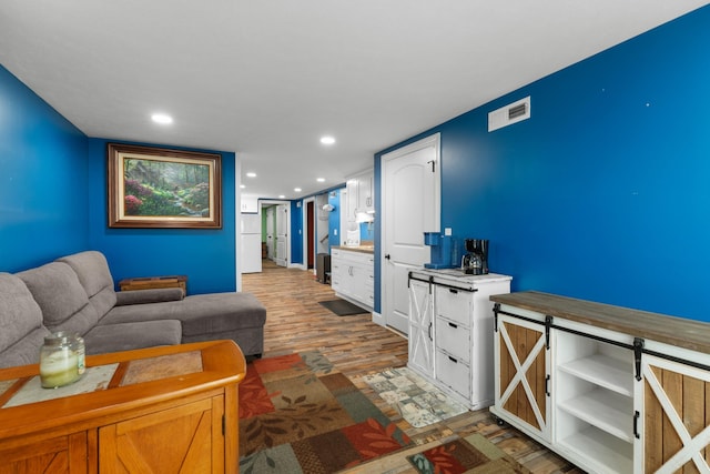 1327 Clinch View Cir, Jefferson City, TN 37760 - living room featuring wood finished floors and recessed lighting