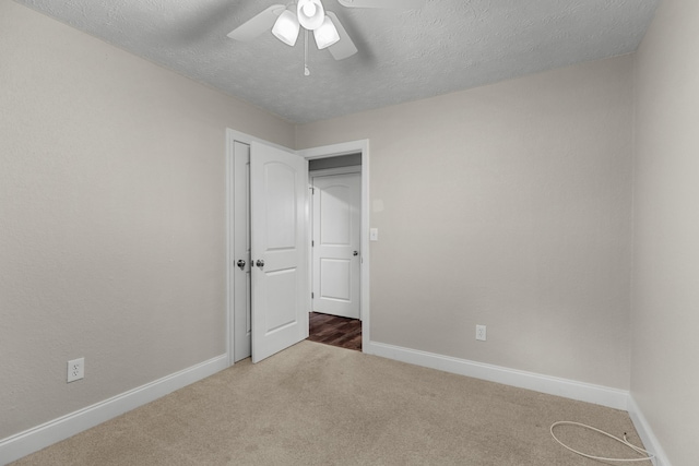 1327 Clinch View Cir, Jefferson City, TN 37760 - unfurnished bedroom featuring carpet floors, baseboards, a textured ceiling, and ceiling fan