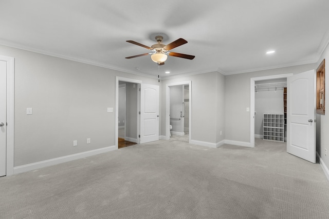 1327 Clinch View Cir, Jefferson City, TN 37760 - unfurnished bedroom with recessed lighting, crown molding, baseboards, light carpet, and a walk in closet