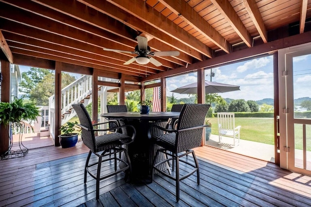 1662 Canal Ln, Dandridge, TN 37725 - sunroom / solarium featuring outdoor dining area, a ceiling fan, healthy amount of natural light, and beamed ceiling