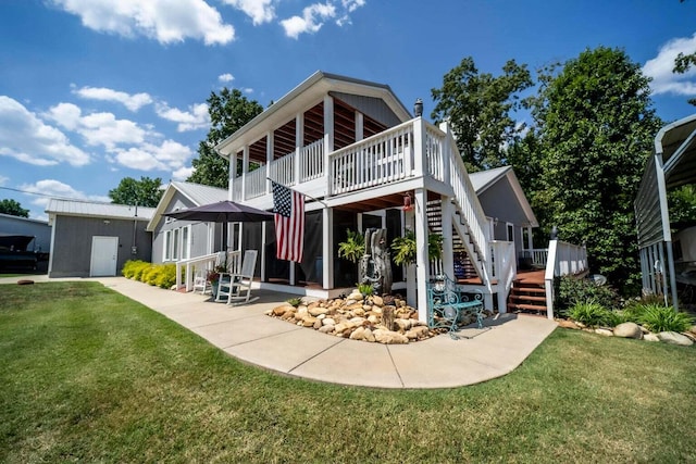 1662 Canal Ln, Dandridge, TN 37725 - back of property featuring stairs, a deck, a yard, and a patio