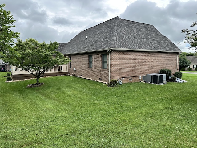 4815 Stapleton Rd, Morristown, TN 37813 - view of side of home with brick siding, roof with shingles, a yard, and crawl space