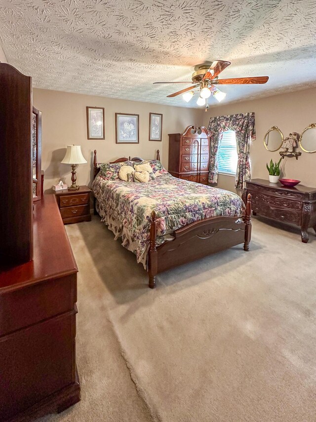 4815 Stapleton Rd, Morristown, TN 37813 - carpeted bedroom with a textured ceiling and ceiling fan