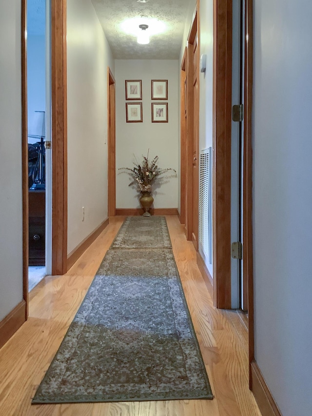 4815 Stapleton Rd, Morristown, TN 37813 - corridor featuring light wood-type flooring and baseboards