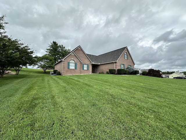 4815 Stapleton Rd, Morristown, TN 37813 - view of side of property featuring brick siding and a lawn