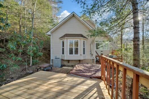 wooden terrace featuring central AC