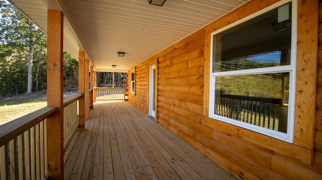 wooden terrace featuring a porch