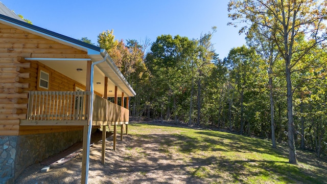 view of yard with a wooden deck