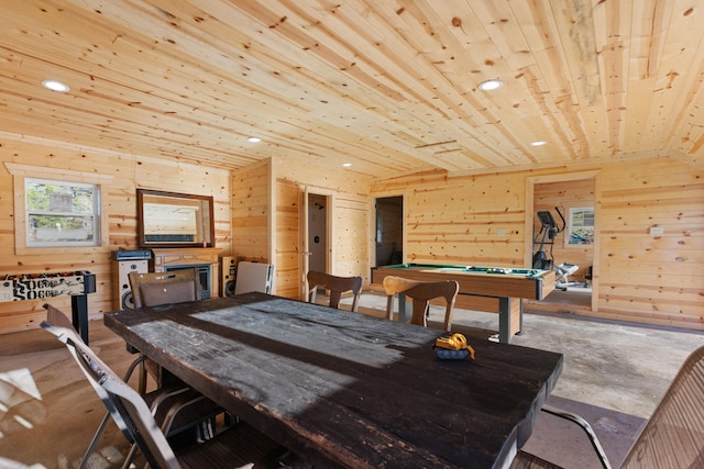 dining space featuring wooden walls, wooden ceiling, lofted ceiling, and billiards