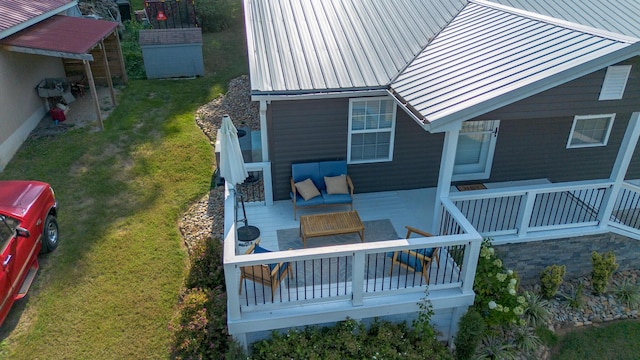 exterior space with a lawn and outdoor lounge area