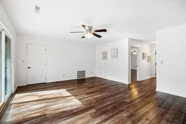 unfurnished room featuring ceiling fan and dark hardwood / wood-style floors