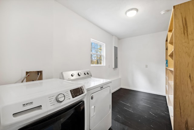 laundry room featuring electric panel and independent washer and dryer