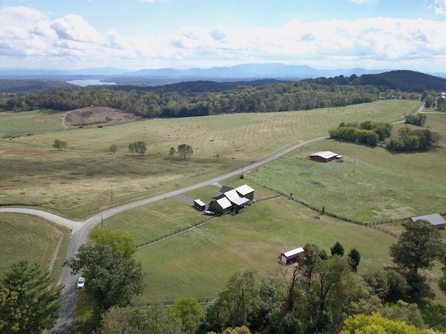 bird's eye view with a mountain view and a rural view