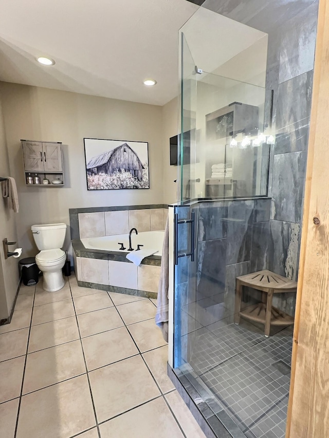 bathroom with separate shower and tub, tile patterned flooring, and toilet